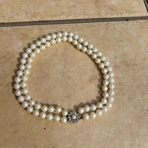 Elegant Cream Pearl Necklace with Floral Clasp